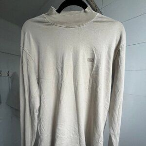 beige kith long sleeve shirt